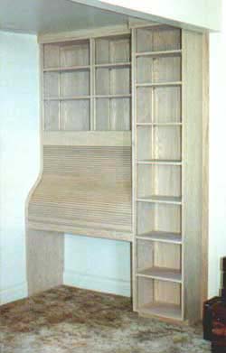 Oak rolltop/bookcase with a natural finish